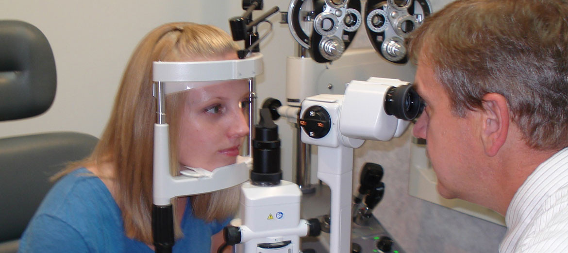 A patient having her vision checked at Richard C. Annis, O.D., P.C.
